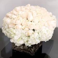 White blooming flower of hydrangea in glass vase, on white. White Roses And White Hydrangea Cube In Glen Head Ny Glen Head Flower Shop