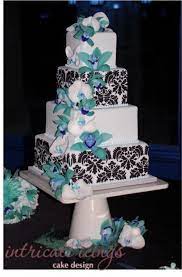 Piece Of Cake I Want Red Not Blue Flowers Black And White Damask Cake With Initial Google Search Damask Wedding Cake Damask Cake Beautiful Wedding Cakes