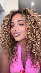 At what age did you embrace the fullness of your hair?