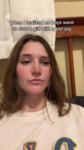 Girl with a Pet Pig: Merlin and I Share the Bed