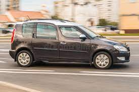 Skoda Roomster Compact Popular Car on the City Highway, Side View. Brown  Family Mpv Driving on the Street Editorial Stock Image - Image of dynamic,  blur: 231612574