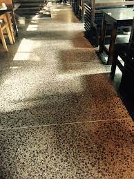Photo 6 Polished Concrete Floor With Dark Coloured Exposed Aggregate Works Well With The Dark Coloured Tim Polished Concrete Concrete Floors Terrazzo Flooring