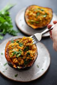 Stuffed Acorn Squash With Curried Lentils Recipe Lentil Curry Nutritious Snacks Acorn Squash