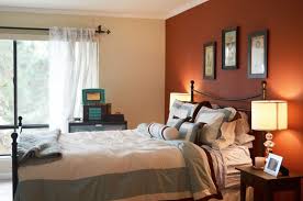 Charming Bedroom Design With Orange Accents Wall Painted And Engaging Iron Beds Also Cha Orange Accent Walls Wall Color Combination Accent Walls In Living Room