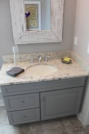 The choice enlivens the retro bathroom that looks casual with a white hue. Painting Bathroom Cabinets Grey Painting Inspired
