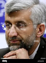 Iran's top nuclear negotiator Saeed Jalili listens to questions during his  lecture in Tokyo, Tuesday, Dec. 22, 2009. (AP Photo/Koji Sasahara Stock  Photo
