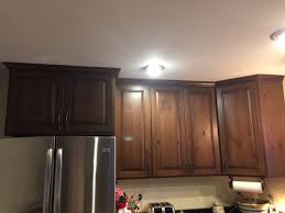 amish kitchen brown maple cabinets