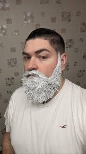 My hubby is at man cave trimming his santa beard