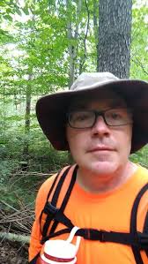TNC’s Dan Shaver discovers the invasive Japanese spirea in a Brown County  forested area