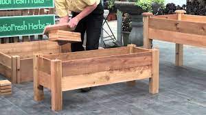 How To Build A Simple Elevated Garden Bed With Louis Damm Elevated Garden Vegetable Garden Raised Beds Garden Beds