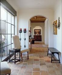 Beautiful Hallway With Saltillo Tile And Floor To Ceiling Window Spanish Decor Floor Design Spanish Style Homes