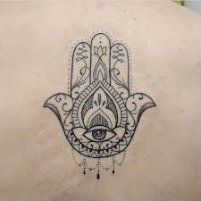 Hamsa E Uma Palavra De Origem Arabe E Significa Cinco Na Traducao Literal Para A Lingua Portuguesa Hamsa Hand Tattoo Hamsa Tattoo Design Small Hamsa Tattoo Pile of small stone as pyramid and pink plumeria flower. pinterest