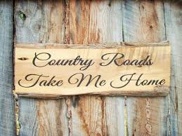 Country Roads Take Me Home Sign Montana Made By Bearlyinmontana Country Roads Take Me Home Country Decor Rustic Country Roads