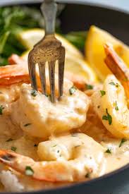 This shrimp and mushrooms sauce is luscious, juicy and just succulent. Creamy Garlic Prawns Shrimp Recipetin Eats