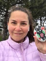 Can you share photos of the painted rocks hidden at West Coffs Harbour?