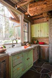 Ultra luxury log cabin interior. Tour A Gorgeous Rustic Mountain Cabin Retreat In Big Sky Rustic Cabin Kitchens Small Rustic Kitchens Rustic Kitchen Design