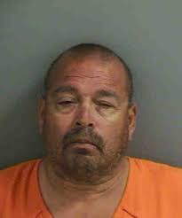 East Naples man charged with arson after dumpster fire outside liquor store