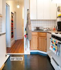 For a pleasing aesthetic, the textured kitchen backsplash complements perfectly with the floor tiles. Before And After A Kitchen Floor Gets A Rubber Makeover Rubber Flooring Kitchen Rubber Flooring Temporary Flooring