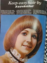 1960s advertisements with hair cut and paper dress
