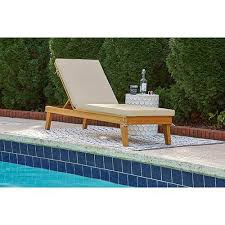 Create a shady oasis by placing outdoor patio umbrellas over your chaise lounges, and then ensure refreshments are within easy reach with a charming patio side table. Signature Design By Ashley Byron Bay Outdoor Chaise Lounge Set Of 2