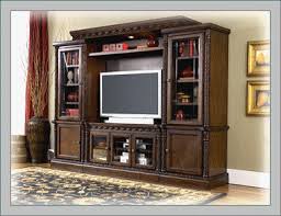 Find modern lcd/tv unit cabinet, furniture, panel, rack, console & wall design ideas for hall & living room. Living Room Hall Showcase Designs With Cement Novocom Top