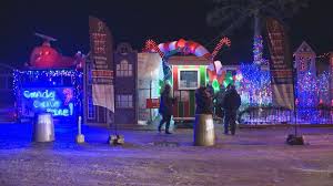 Top view of christmas pie with icing on white wooden table with candy canes, gifts and cocoa with it is the season to be jolly lettering. Parking Woes Cloud Regina Candy Cane Lane Christmas Cheer Regina Globalnews Ca
