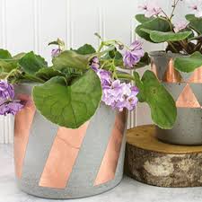 You can use a sharp utility knife, or, to go faster, use a circular saw to carefully make the cut. Garden Style Diy Cement And Copper Pots The Home Depot