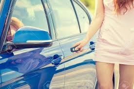 Usually i can use the key manually, but today the key would not turn. Young Woman Presses Unlock Button On Car Remote Control Unlocks Door Alarm Systems Vehicle Convenience Safety Security System Stock Photo Picture And Royalty Free Image Image 37959594