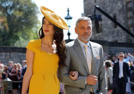 (at least, according to how the vogue team reacted when we caught sight of her yellow dress). Amal Clooney Just Won The Royal Wedding In A Stunning Bright Yellow Stella Mccartney Dress