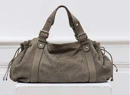 Dans sa collection de vêtement on peut par. Gerard Darel Le 24 Heures Zippe Cuir De Veau Nubucke Decoupe Au Laser Pour Un Effet Ecailles Sac Cuir Sac Gris Sac