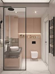 Ein Kleines Badezimmer Mit Deckenleuchten Weissem Fliesenboden Ein Rundes Waschbecken Badideen Kleines Bad Gestalten Badideen Kleines Bad Kleine Badezimmer