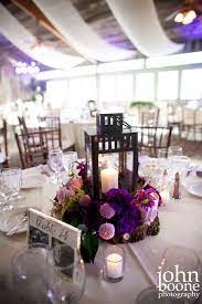 Purple And Lavender Wedding Reception Centerpiece By Floral Fields Of Burbank Ca Wedding Reception Centerpieces Purple Wedding Reception Rustic Purple Wedding