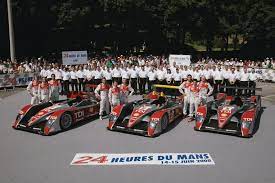 This Picture Shows And Audi Race Team In A Photo Shoot With The Crew Audi Le Mans