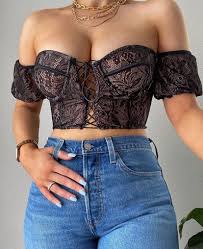 One of the main issues with cropped corset tops is the amount of midriff it reveals. Corset Top With Blue Jeans And Golden Chains Bustier Top Fashion Lace Bustier Top