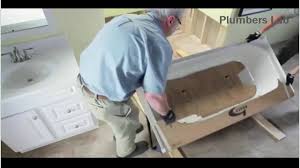 This option allows you to save money and time by adding a it requires a lot of strength to pry away the pieces of the old material without damaging the tub underneath. How To Install A Bathtub Step By Step Installation Process Plumbers Lab Youtube