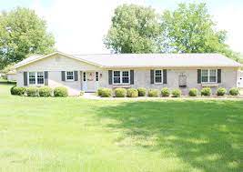 Using a hose, wet the brick down. Limewash Your Brick House