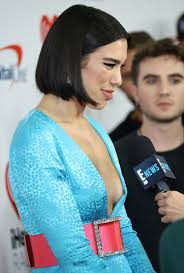 Dua Lipa Slight Nipple Peek on the Red Carpet - Taxi Driver Movie