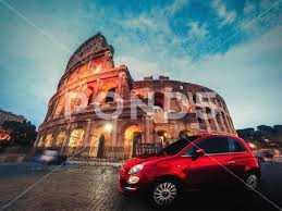 Does fiat chrysler (fcau) have what it takes to be a top stock pick for momentum investors? Fiat 500 Red Car Standing In Front Of Colosseum In Rome Italy Stock Photos Ad Car Standing Red Fiat Fiat 500 Red Red Car Fiat 500
