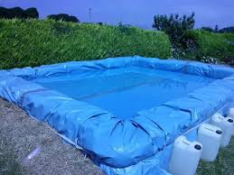 Diy Swimming Pool Using Hay Bales Building A Swimming Pool Diy Swimming Pool Swimming Pools