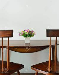 Get it as soon as fri, jun 25. Small Dining Table With Artificial Flower Pot Stock Photo Picture And Royalty Free Image Image 16905302