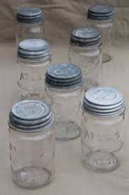 Some of the zinc lids have ball embossed on them, but others are just plain. Vintage Pint Size Mason Jars W Zinc Metal Lids Antique Glass Canning Jar Lot