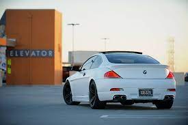 Bmw e63 6 series coupe m6 fuel consumption (economy), emissions and range. Hd Wallpaper Bmw M6 E63 White White Bmw M Series Elevator Roof White Tail Of Parking Wallpaper Flare