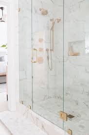Calacatta gold is an exclusive white marble with deep gray veining and occasional taupe/gold highlights. Shower Calacatta Gold Marble Tile Classic Shower Calacatta Gold Marble Tile Ideas Showertile Calacattago Calacatta Gold Marble Classic Showers Shower Remodel