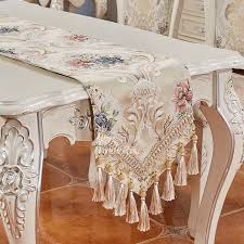 This table runner provides a great place to set down platters to prevent spills and scratches on your tabletop while adding style and flair. Living Room Coffee European Luxury Tablecloth Table Runner Floral