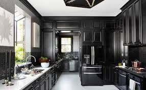 This gray and white family kitchen has touches of gold and warm accents. 12 Foolproof Ways To Do Black Cabinets Right