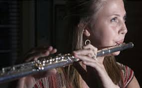 Teen flautist tops again