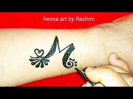 Familiaris) occurring as a wide variety of breeds, many of which are traditionally used for hunting, herding, drawing sleds, and other tasks, and are kept as pets. M Letter Henna Mehndi Tattoo Alphabet M Tattoo Diy M Tattoo With Heart Shape Youtube Alphabet Tattoo Designs Small Tattoo Designs Mehndi Tattoo