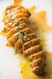 The flavor in this paleo herb pork tenderloin recipe will knock your socks off! Pumpkin Butter Thyme Pork Tenderloin Tastes Lovely