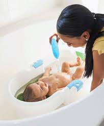 Baby taking bath in sink : Baby S First Bath How To Bathe A Newborn