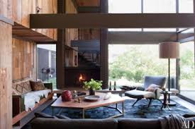 It's made from engineered wood with a dark taupe tone that the gorgeous solid wood table offers rustic farmhouse style. 13 Utterly Inviting Rustic Living Room Ideas Architectural Digest